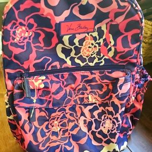 Vera Bradley backpack colors are purple, pink and white